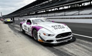 The no.20 GYM WEED CD Racing Ford Mustang in the pit at Indianapolis Motor Speedway